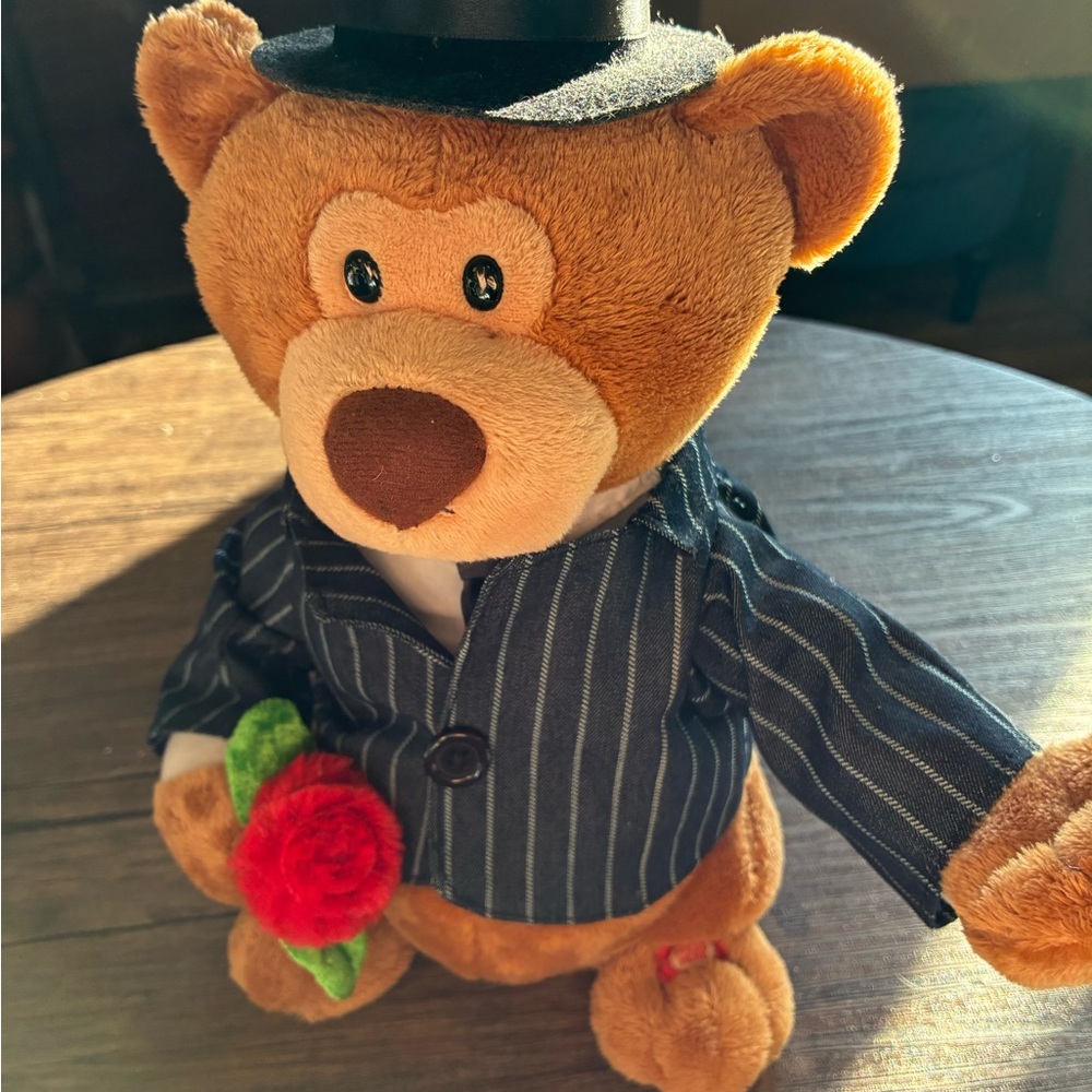 Singing Teddy Bear with Red Rose